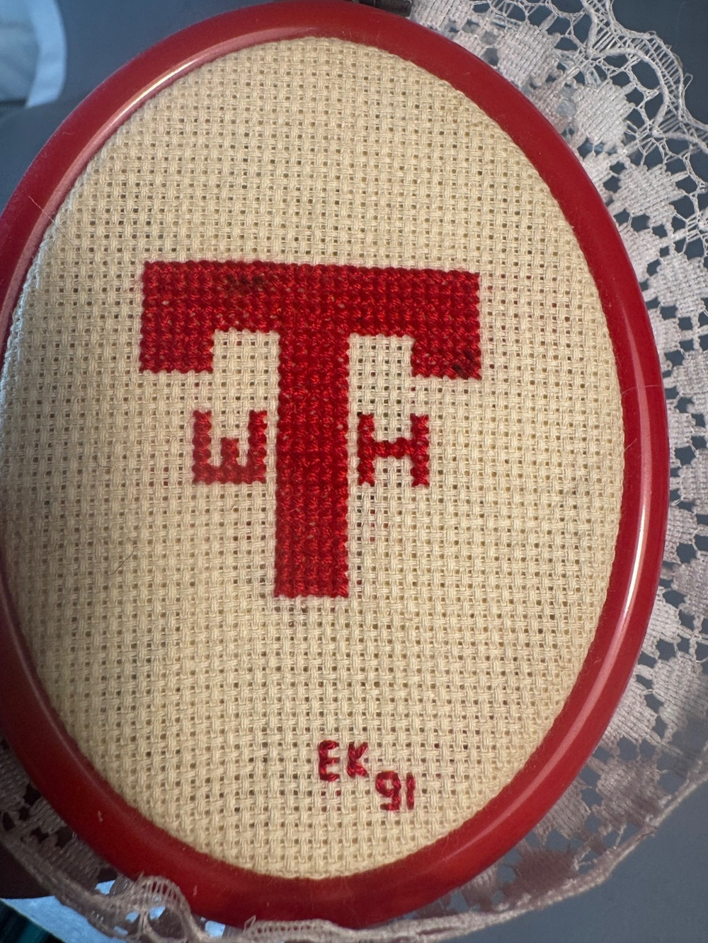 Cross Stitch completed in a 4" frame with initials WHT red/cream with lace